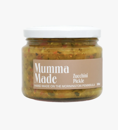Jar of 'Mumma Made' zucchini pickle on a white background