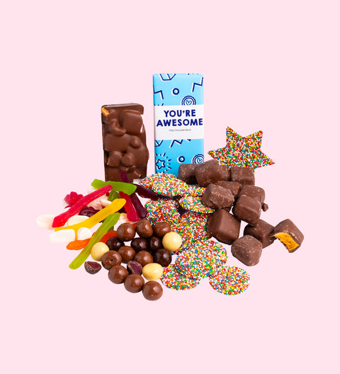 Luxury 'With Gratitude' Chocolate Hamper
1 x Luxury Gloss White Hamper Gift Box
1 x Freckle Star
1 x Premium Milk Chocolate 'You're Awesome' Block
1 x 200g Milk Chocolate Freckles
1 x 200g Mixed Chocolate Raspberries
1 x 200g Lolly Jumble
1 x 200g Chocolate Honeycomb
1 x Milk Rocky Road
1 x Option to Add: Occasion Message on Hamper