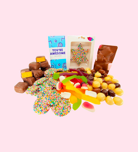 Luxury 'With Gratitude' Chocolate Hamper
1 x Luxury Gloss White Hamper Gift Box
1 x Freckle Star in Box
1 x Premium Milk Chocolate 'You're Awesome' Block
1 x 200g Milk Chocolate Freckles
1 x 200g Mixed Chocolate Raspberries
1 x 200g Lolly Jumble
1 x 200g Chocolate Honeycomb
1 x Milk Rocky Road
1 x Option to Add: Occasion Message on Hamper