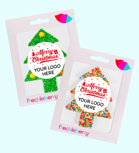 Two Christmas-themed pins in packaging with 'freckleberry' branding. Corporate Branding