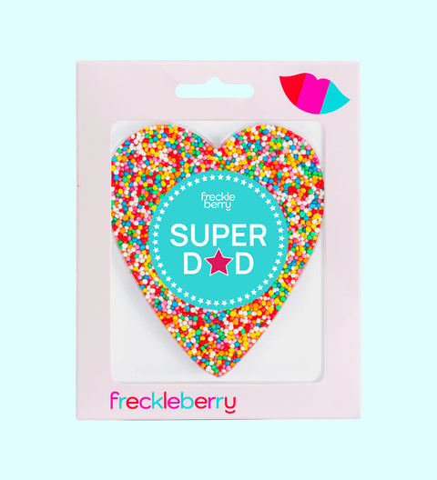A heart-shaped chocolate with 'HAPPY FATHER'S DAY' written in the center, surrounded by colorful sprinkles. The product is packaged in a box with the brand name 'freckleberry' at the bottom.