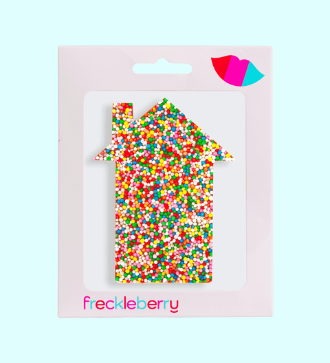 Chocolate freckled house for new home owners, real estate agents
