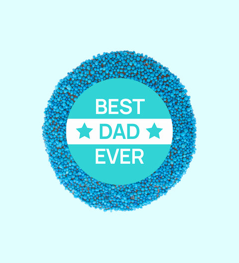 A chocolate freckle with 'BEST DAD EVER' written in the center, against a blue background.