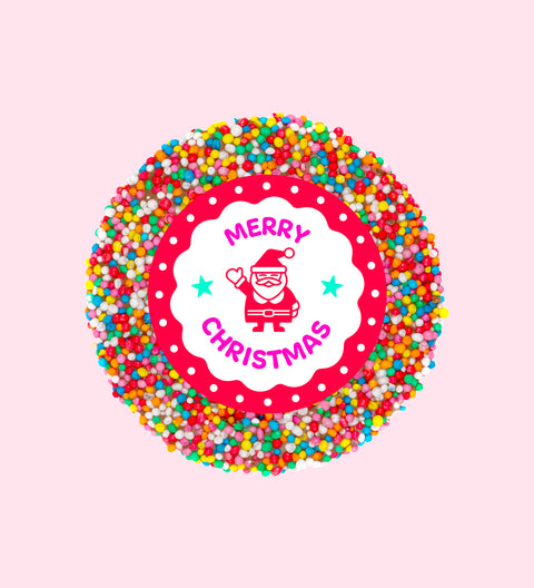 Individually wrapped chocolate freckle with 'Merry Christmas Santa' text and colorful sprinkles on a pink background.