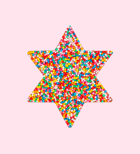 A star-shaped chocolate covered in multicolored sprinkles.