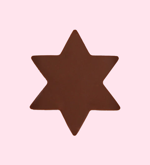 A single plain milk chocolate star-shaped candy against a white background.
