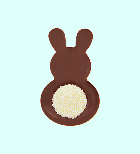 dark chocolate bunnies with freckle tails in various colors as Easter gifts