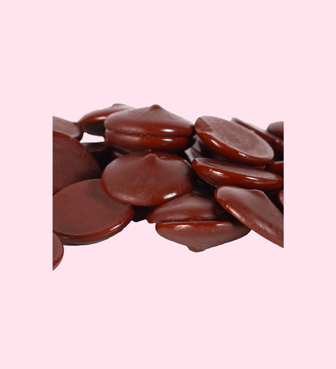 Belgian dark chocolate pastilles close up