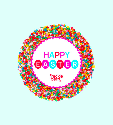 A colorful chocolate freckle with 'Happy Easter' text in the center, individually wrapped.