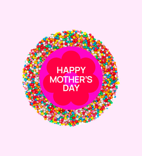 A colorful chocolate freckle with 'Happy Mother's Day' text in the center, individually wrapped.