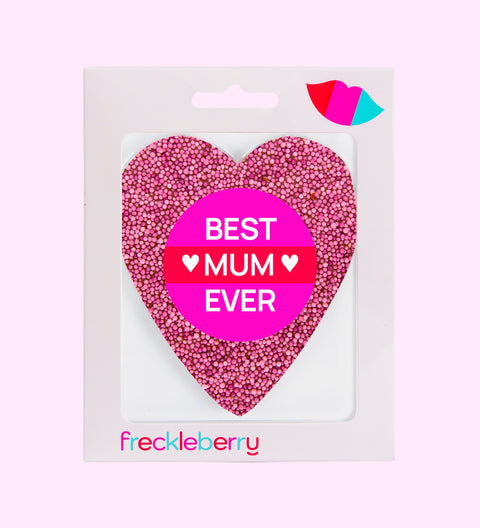 A pink freckle heart-shaped chocolate with a 'SUPER MOM' text in the center on a white background.