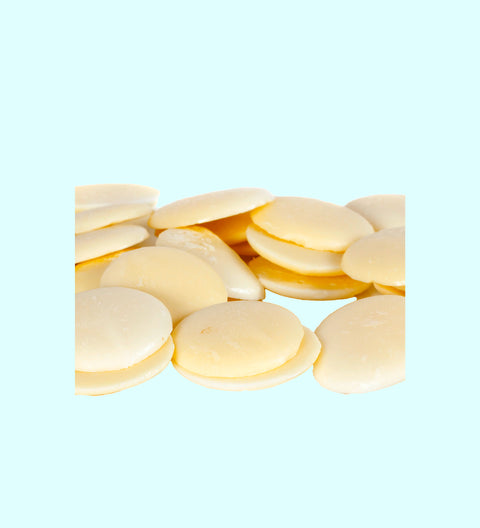 Belgian white chocolate pastilles close up