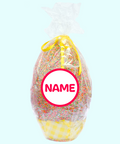 A show-stopping Belgian milk chocolate egg with colourful sprinkles, available with a personalised name for a truly special gift.