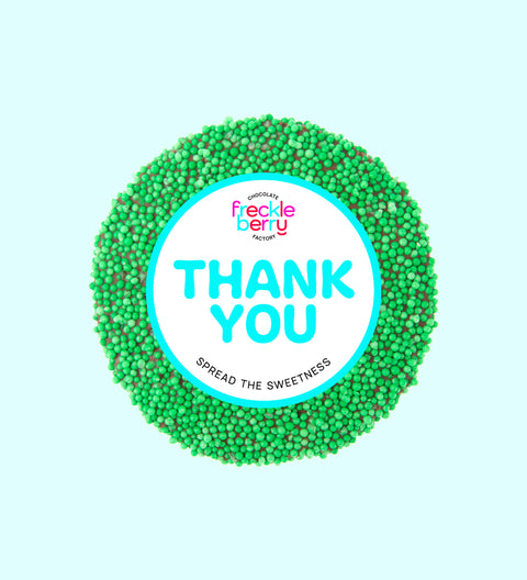 Creamy premium Belgian milk chocolate topped with vibrant green sprinkles with "Thank You" Label/design, a sweet way to say thanks and show appreciation.