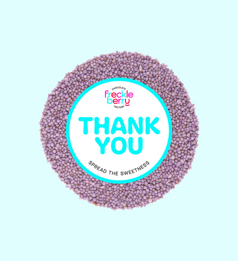 Creamy premium Belgian milk chocolate topped with vibrant purple sprinkles with "Thank You" Label/design, a sweet way to say thanks and show appreciation.