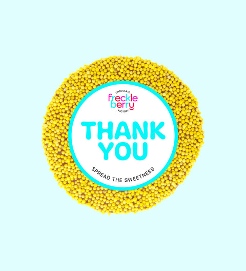 Creamy premium Belgian milk chocolate topped with vibrant yellow sprinkles with "Thank You" Label/design, a sweet way to say thanks and show appreciation.