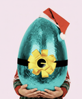 A luxurious Belgian milk chocolate santa egg wrapped in vibrant aqua foil packaging, perfect for an indulgent and show-stopping Christmas gift.