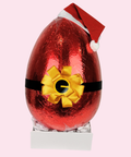 A luxurious Belgian milk chocolate santa egg wrapped in vibrant red foil packaging, perfect for an indulgent and show-stopping Christmas gift.