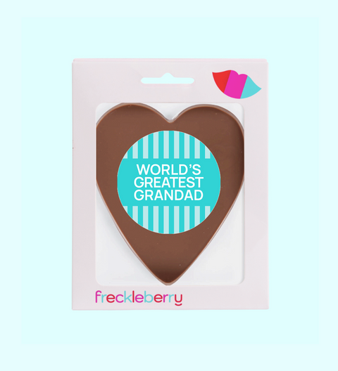 Heart-shaped chocolate with 'World's Greatest Grandad' message in packaging on a light blue background