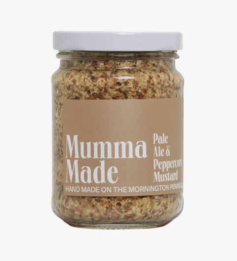 Jar of 'Mumma Made' pale ale and peppercorn mustard on a white background