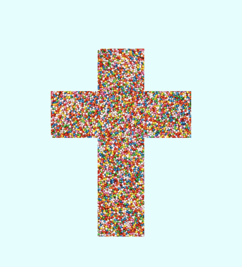 Colourful cross-shaped object on a light blue background