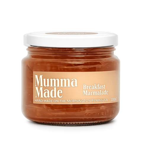 A 300ml glass jar of Mumma Made Breakfast Marmalade with a white lid and a beige label, set against a plain white background.