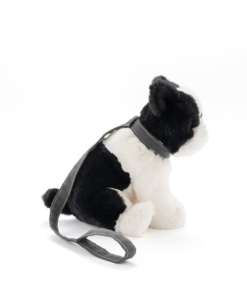 A soft plush dog toy with a charming personality and refined style. Perfect for babies, kids, and comforting cuddles.