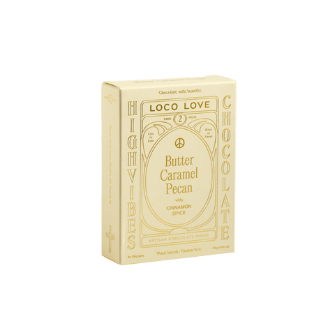 Box of Loco Love Butter Caramel Pecan chocolate on a white background