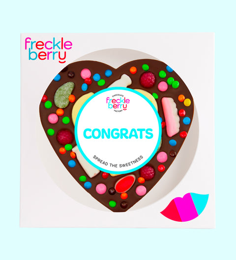 Premium giant Belgian dark chocolate heart pizza loaded with colourful lollies with "Congrats" design/label -  the perfect fun and festive way to celebrate achievements.