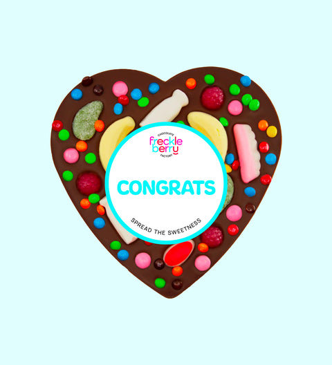 Premium giant Belgian dark chocolate heart pizza loaded with colourful lollies with "Congrats" design/label -  the perfect fun and festive way to celebrate achievements.