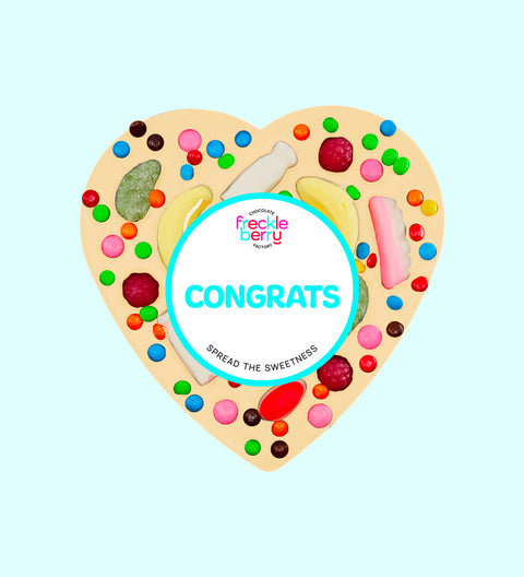 Premium giant Belgian white chocolate heart pizza loaded with colourful lollies with "Congrats" design/label -  the perfect fun and festive way to celebrate achievements.