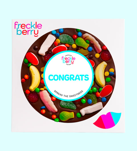 Premium giant Belgian dark chocolate pizza loaded with colourful lollies with "Congrats" design/label -  the perfect fun and festive way to celebrate achievements.