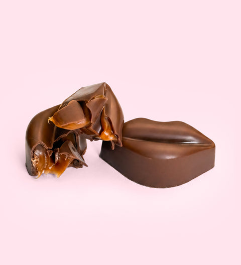 Premium Belgian chocolate lips filled with smooth gooey caramel. The perfect gift for someone special or a delicious treat for yourself. 