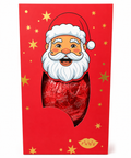 A festive red gift box featuring a cartoon Santa Claus face with a white beard and hat, with a die-cut window showing a large red wrapped chocolate inside. The box is decorated with gold stars and the brand name 'FōkŽu' at the bottom.