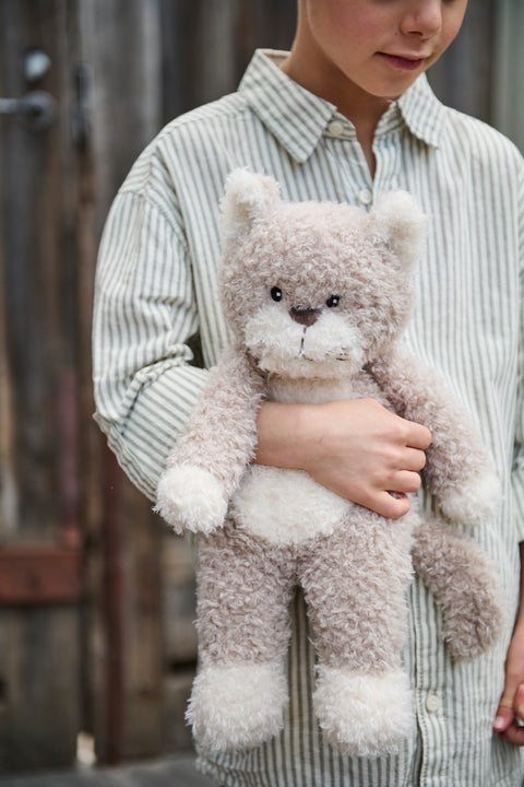 A soft plush cat toy with a playful spirit and cosy charm. Perfect for babies, kids, and comforting cuddles.