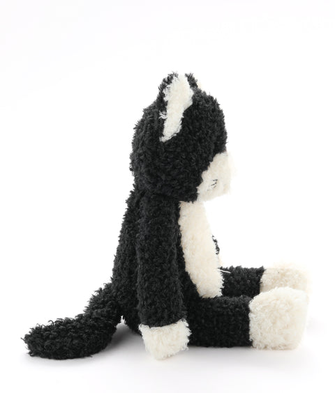 A playful black and white farm feline with a mischievous streak - soft plush toys for kids.
