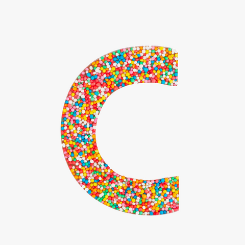 Premium Belgian chocolate letter "C" topped with colourful sprinkles – a fun and tasty treat perfect for personalising any occasion.