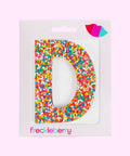 Premium Belgian chocolate letter "D" topped with colourful sprinkles – a fun and tasty treat perfect for personalising any occasion.
