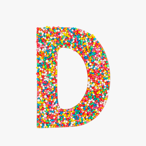 Premium Belgian chocolate letter "D" topped with colourful sprinkles – a fun and tasty treat perfect for personalising any occasion.