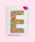 Premium Belgian chocolate letter "E" topped with colourful sprinkles – a fun and tasty treat perfect for personalising any occasion.