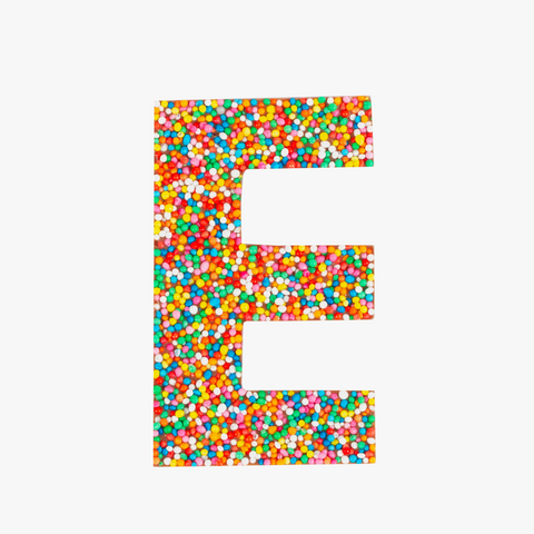 Premium Belgian chocolate letter "E" topped with colourful sprinkles – a fun and tasty treat perfect for personalising any occasion.