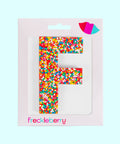 Premium Belgian chocolate letter "F" topped with colourful sprinkles – a fun and tasty treat perfect for personalising any occasion.