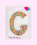Premium Belgian chocolate letter "G" topped with colourful sprinkles – a fun and tasty treat perfect for personalising any occasion.