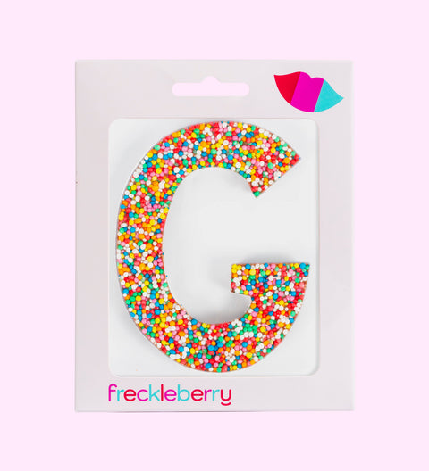 Premium Belgian chocolate letter "G" topped with colourful sprinkles – a fun and tasty treat perfect for personalising any occasion.