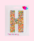 Premium Belgian chocolate letter "H" topped with colourful sprinkles – a fun and tasty treat perfect for personalising any occasion.