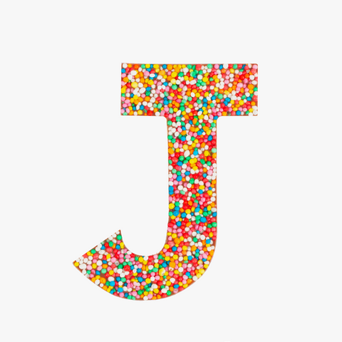 Crafted premium Belgian chocolate letter "J" topped with colourful sprinkles – a fun and tasty treat perfect for personalising any occasion.