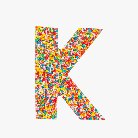 Premium Belgian chocolate letter "K" topped with colourful sprinkles – a fun and tasty treat perfect for personalising any occasion.