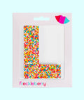 Premium Belgian chocolate letter "L" topped with colourful sprinkles – a fun and tasty treat perfect for personalising any occasion.