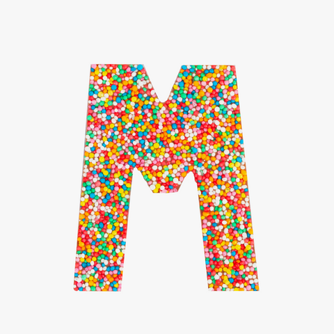 Premium Belgian chocolate letter "M" topped with colourful sprinkles – a fun and tasty treat perfect for personalising any occasion.