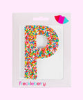 Premium Belgian chocolate letter "P" topped with colourful sprinkles – a fun and tasty treat perfect for personalising any occasion.
